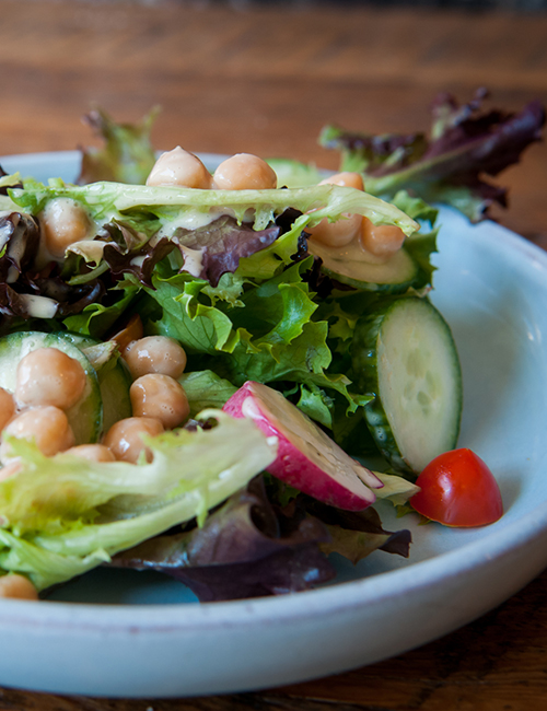 tasty little salad on a plate, with chick peas and fresh croutons