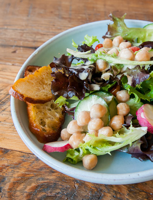 tasty little salad on a plate, with chick peas and fresh croutons
