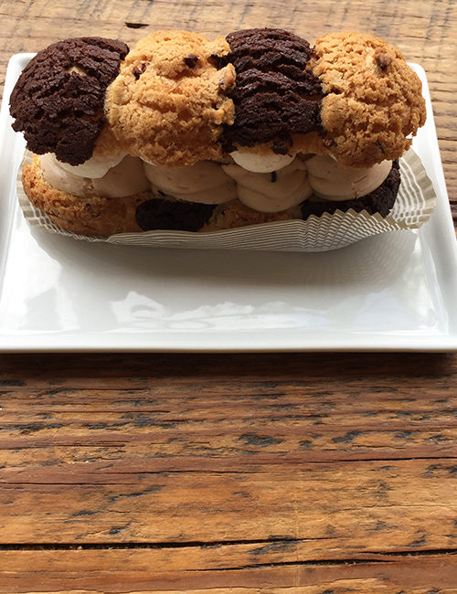 chocolate chip cookie eclair showing mousse and cream fillings